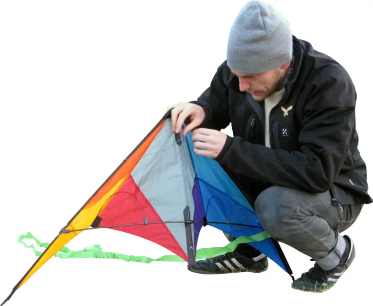 Man Preparing a Colorful Kite