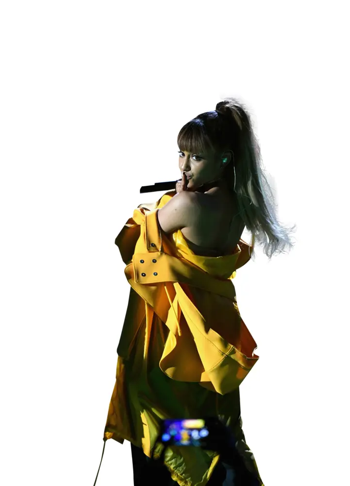 Woman Singing in Yellow Jacket