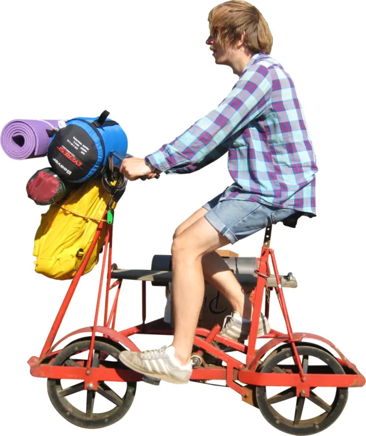 Man Riding a Loaded Bicycle
