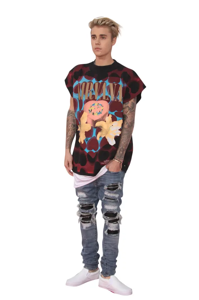 Person in Nirvana Shirt and Ripped Jeans