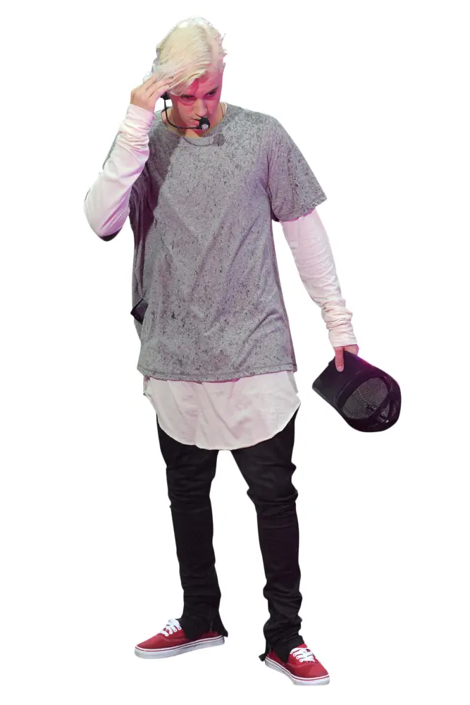 Man in Casual Outfit Holding Cap and Microphone