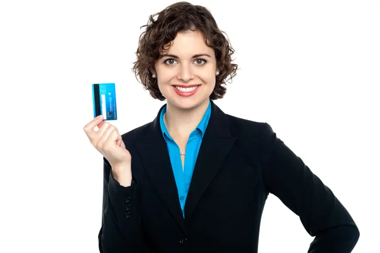 Smiling Woman Holding Credit Card