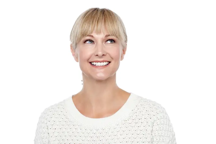 Smiling Woman in White Sweater
