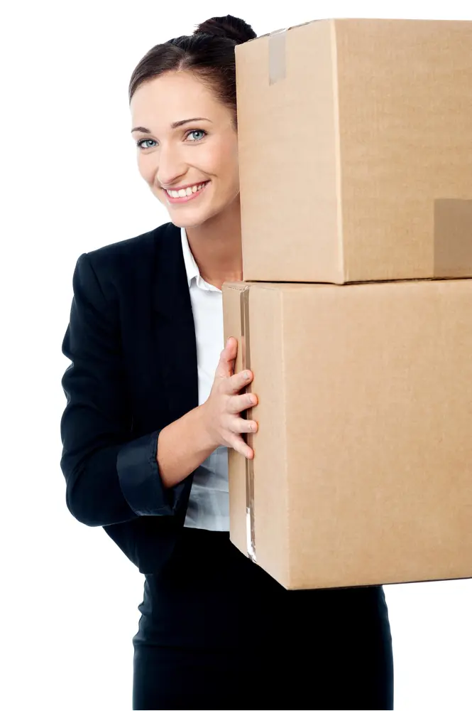 Smiling Businesswoman with Shipping Boxes