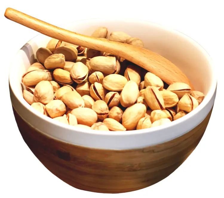 Bowl of Pistachios with Wooden Spoon