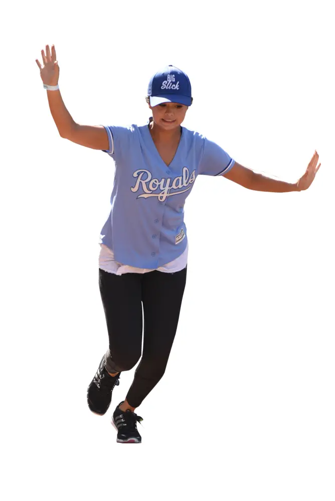 Woman Playing Baseball in Blue Jersey