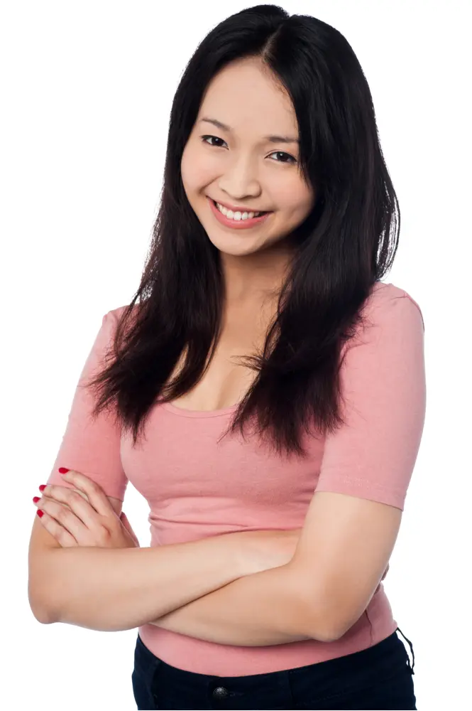 Smiling Woman in Pink Shirt with Crossed Arms
