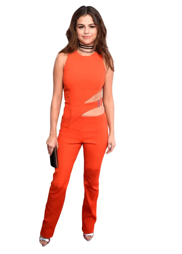Elegant Woman in Red Jumpsuit with Clutch
