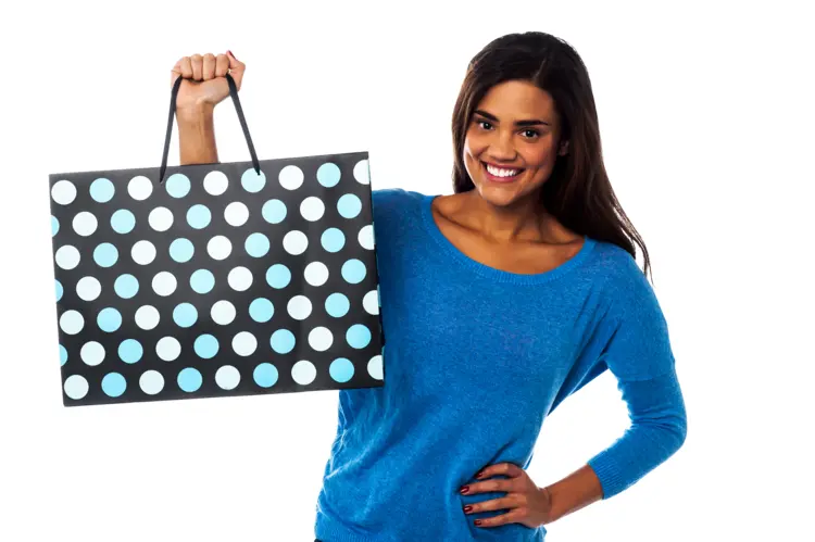 Woman Holding Polka Dot Shopping Bag