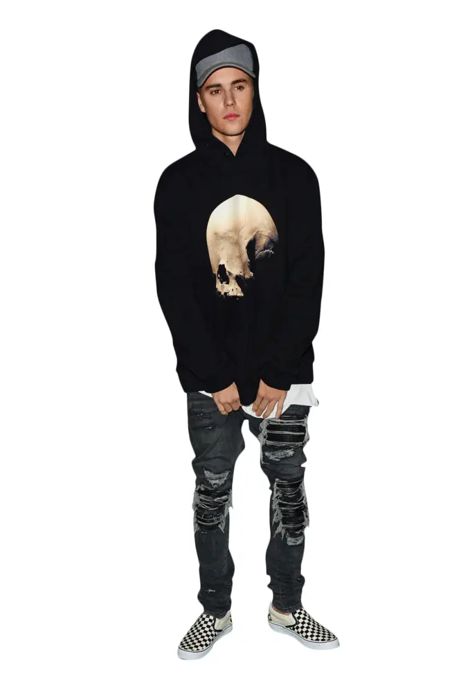 Person in Black Hoodie and Ripped Jeans Standing