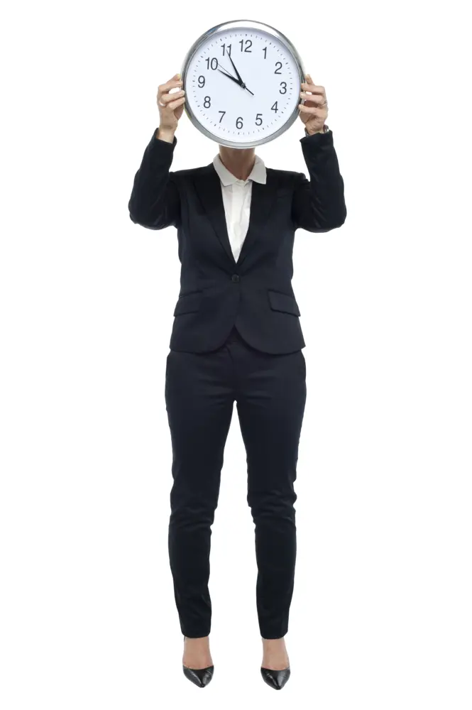 Person in Suit Holding Clock Over Head