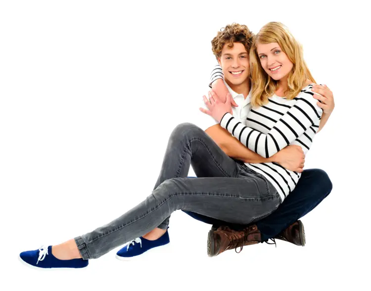 Happy Couple Sitting and Hugging