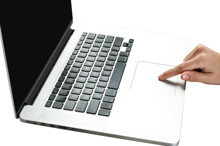Finger on Laptop Touchpad