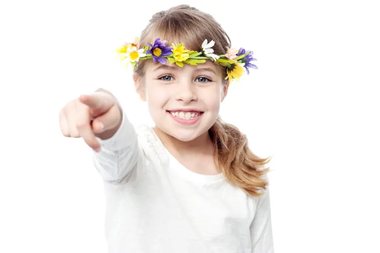 Smiling Girl with Flower Crown Pointing
