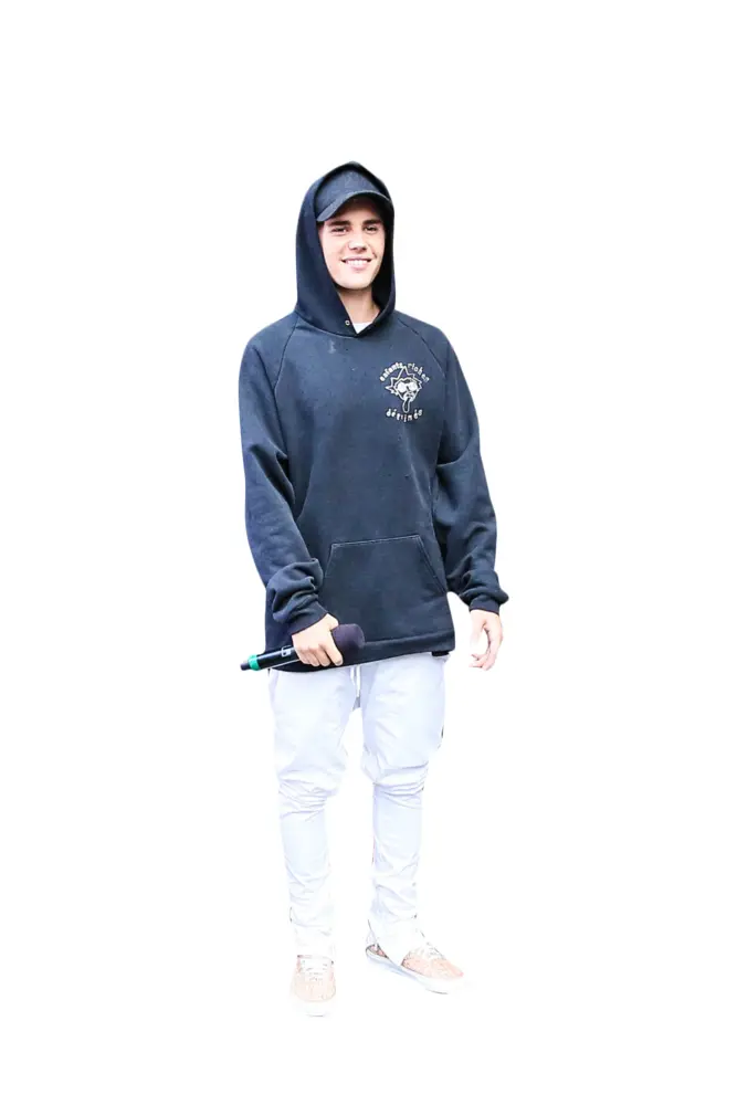 Person in Black Hoodie Holding Microphone