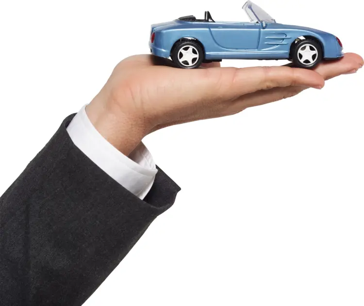 Hand Holding a Toy Car