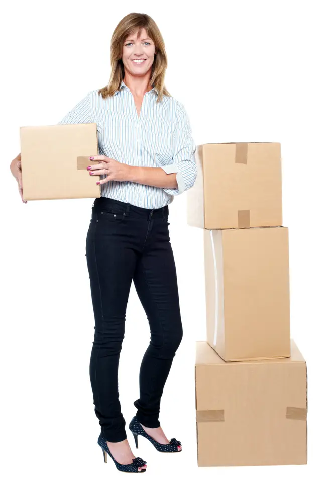 Smiling Woman with Stacked Shipping Boxes