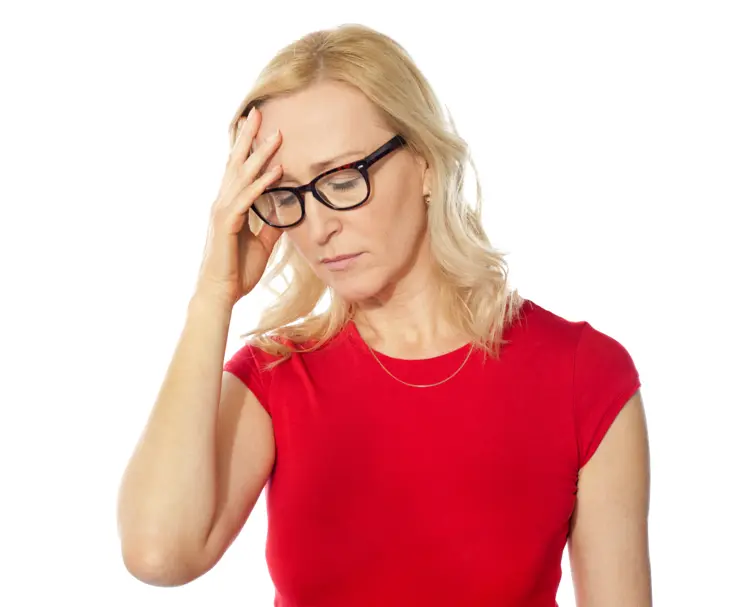 Woman with Headache and Glasses