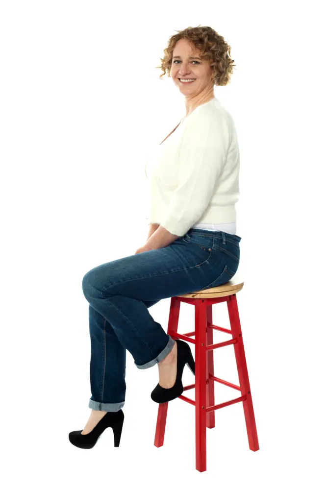 Smiling Woman Sitting on Stool