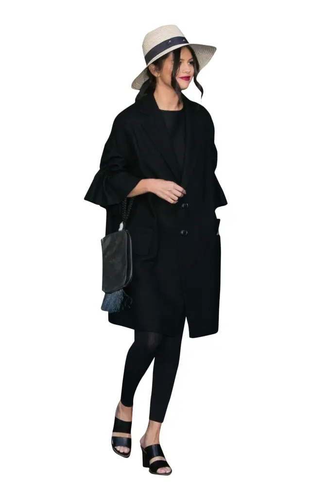 Stylish Woman in Black Coat and Hat