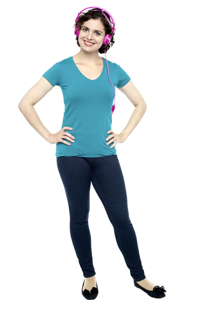 Woman in Blue Shirt and Black Pants with Headphones
