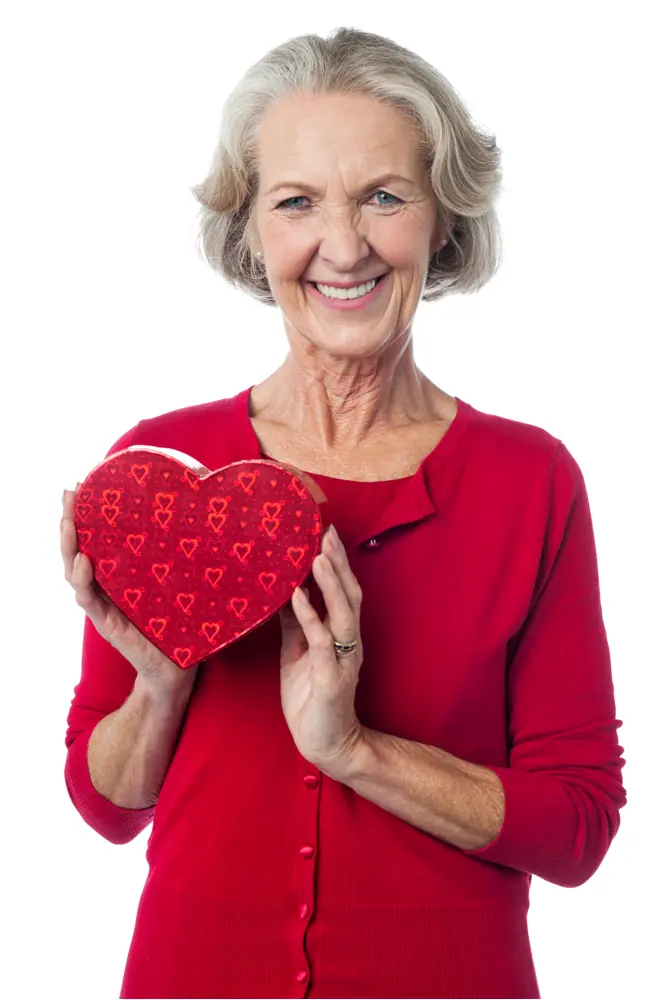 Elderly Woman Holding Heart