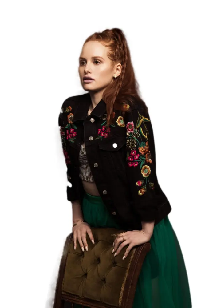 Stylish Woman Leaning in Embroidered Jacket