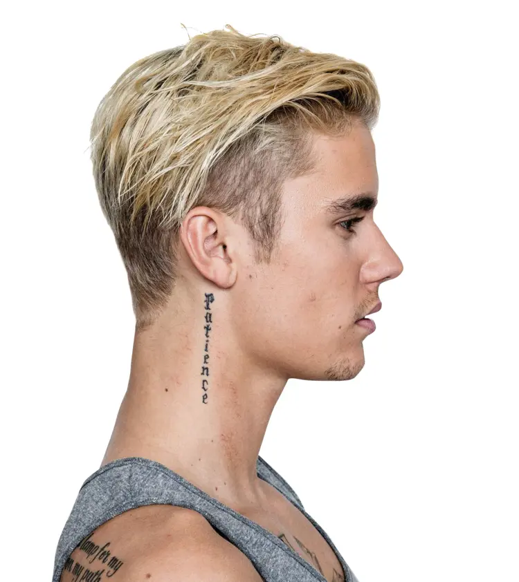 Person with Blonde Hair and Tattoo in Profile View