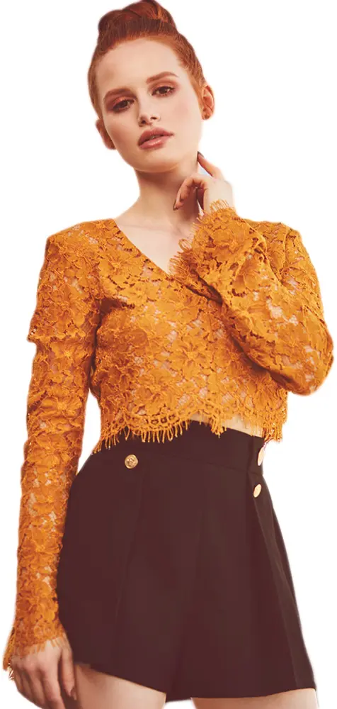 Fashionable Woman in Orange Lace Top and Black Shorts