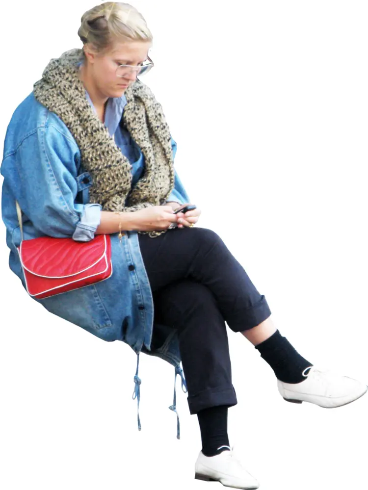 Woman Sitting and Using Phone