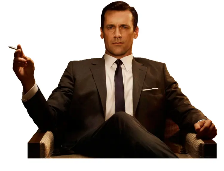 Man in Suit Sitting with Cigarette