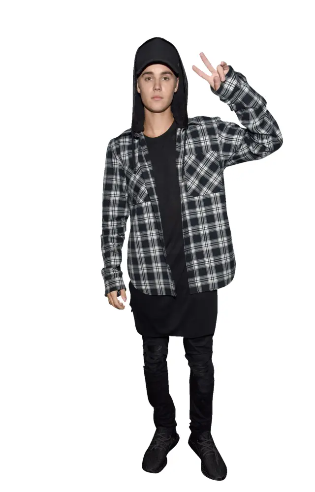 Person in Casual Plaid Shirt and Black Hat