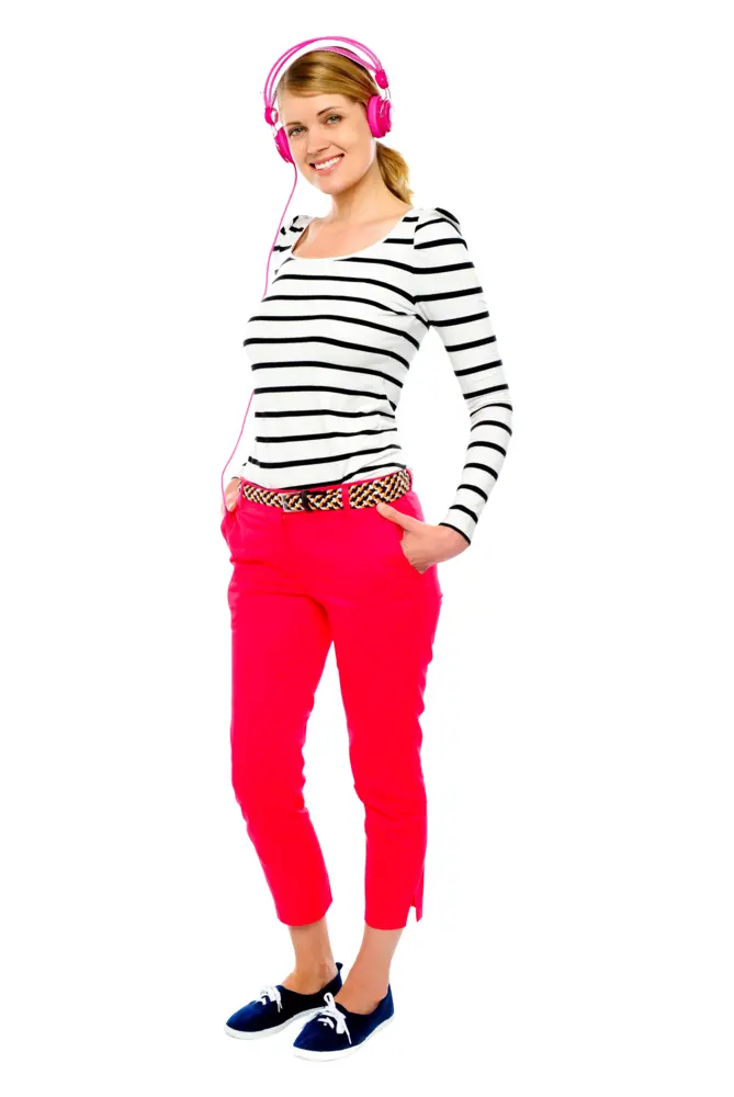 Woman in Striped Shirt and Pink Pants with Headphones