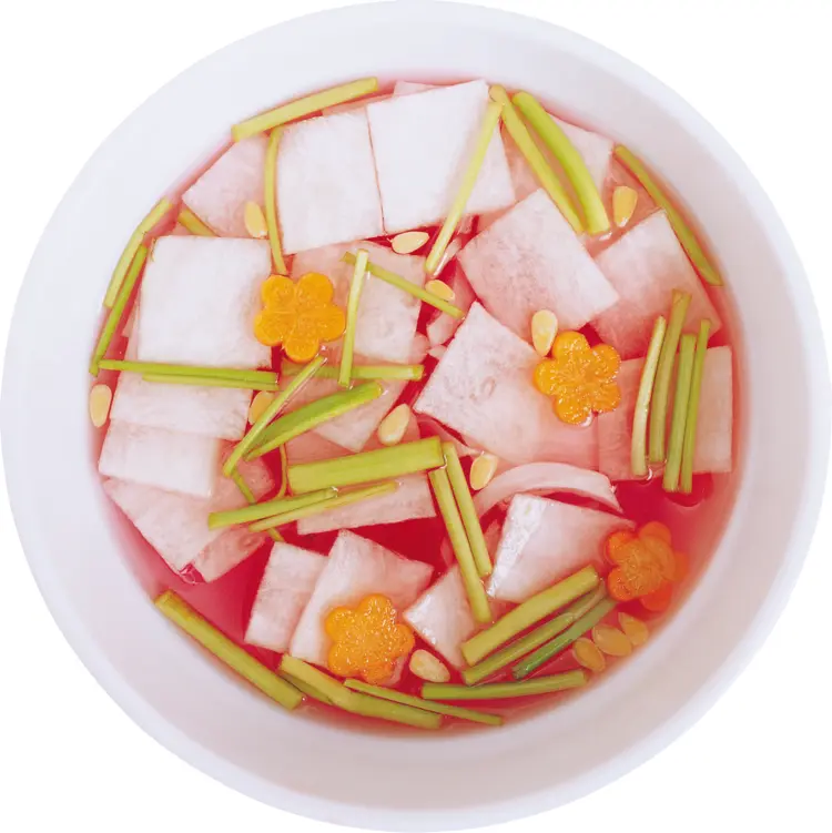 Colorful Soup with Vegetables in a White Bowl