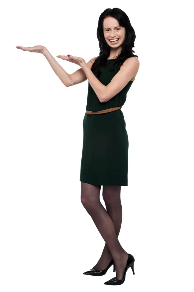 Smiling Woman in Dress Pointing Upwards