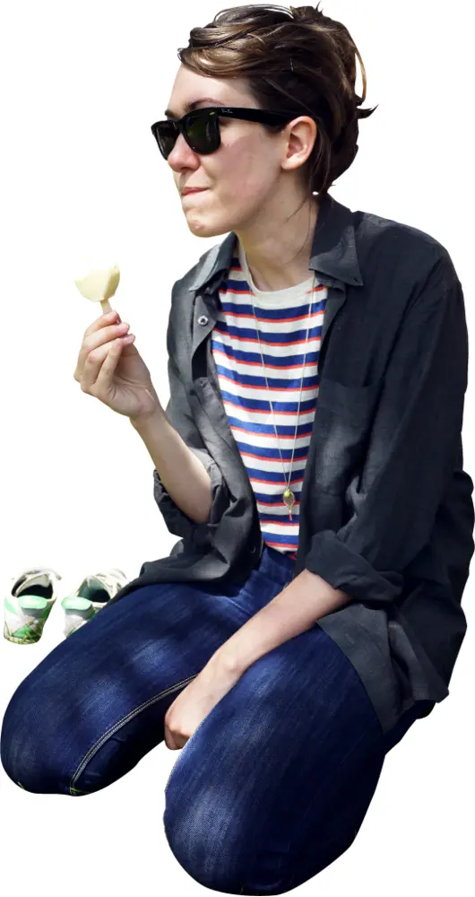 Woman Enjoying a Snack Outdoors