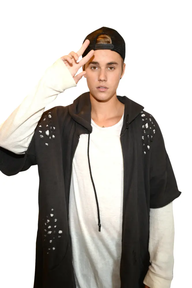 Person in Casual Black Cap and White Shirt