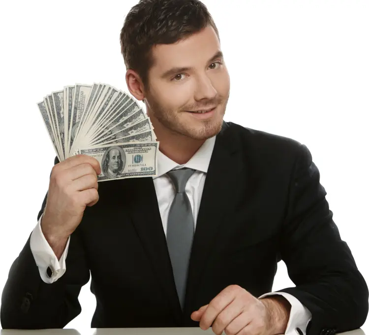 Man Holding Money in Business Suit