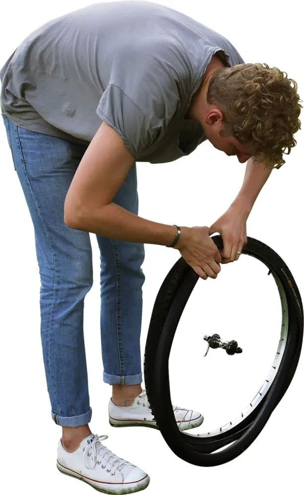 Person Fixing Bicycle Tire