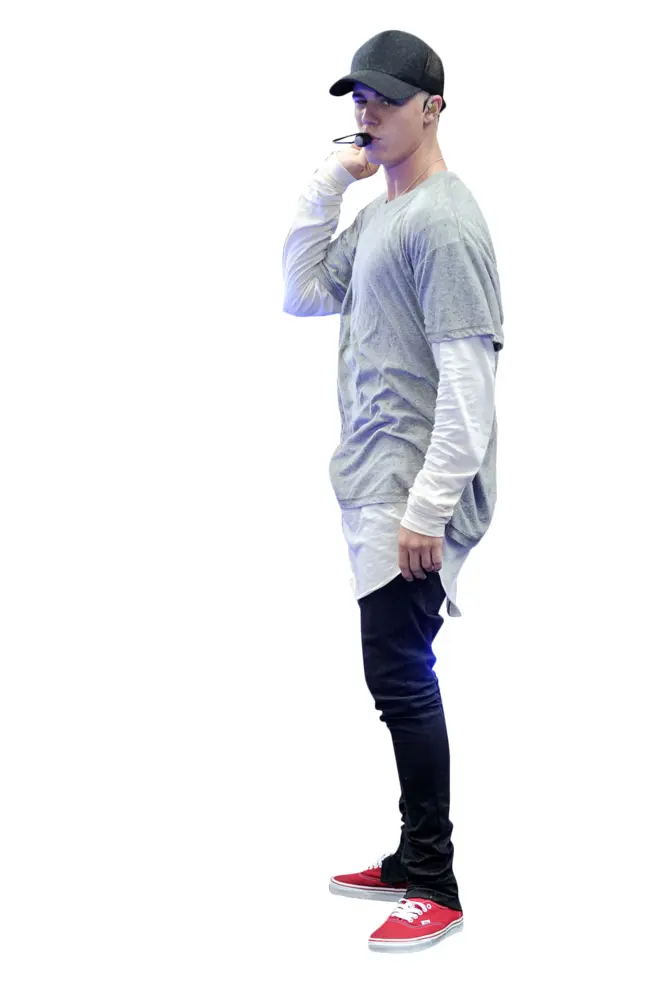 Man in Casual Outfit with Cap and Microphone