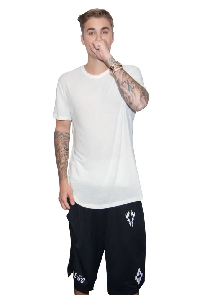 Person in White Shirt and Shorts