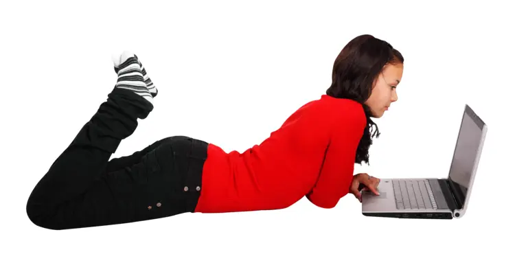 Girl Lying Down Using Laptop