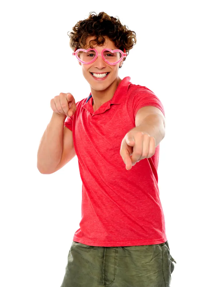 Smiling Man in Pink Glasses Pointing