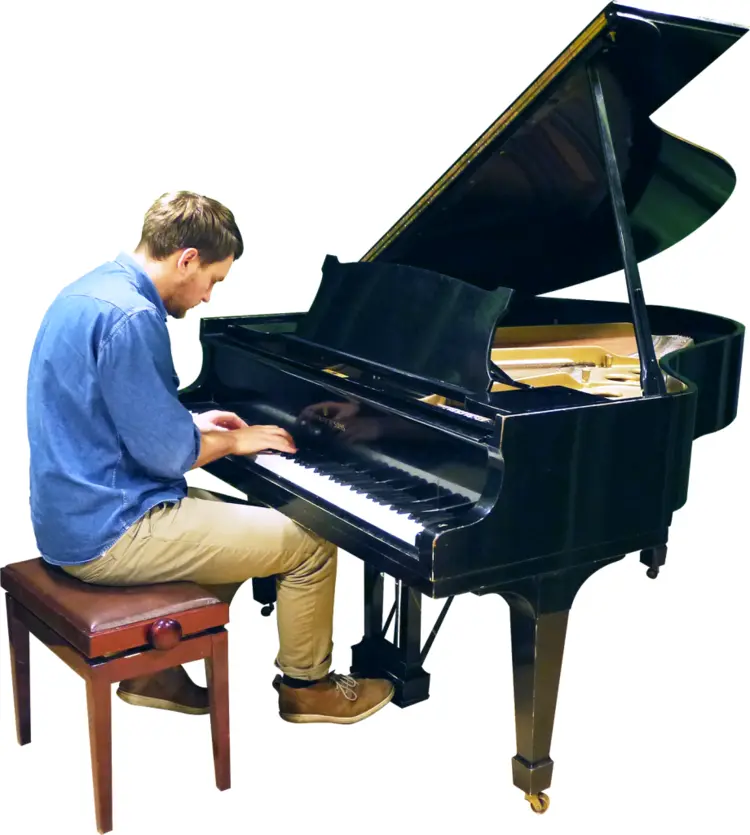 Man Playing Grand Piano