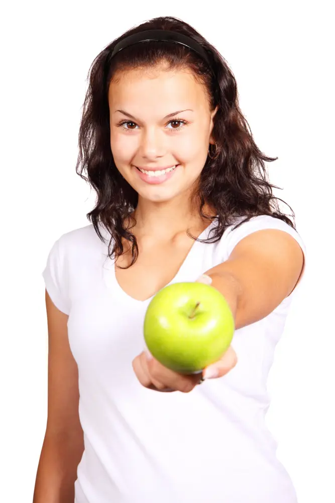 Smiling Woman Holding Green Apple