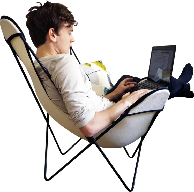 Man Relaxing on Chair with Laptop