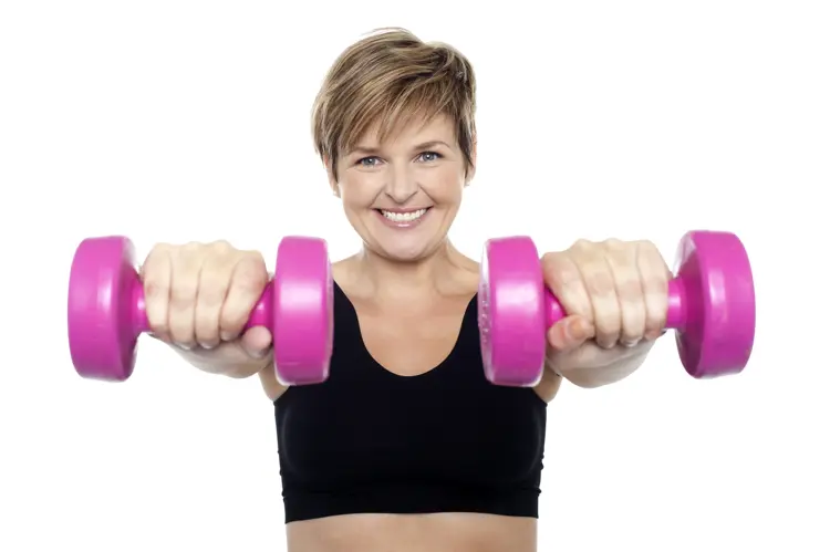 Woman Holding Pink Dumbbells