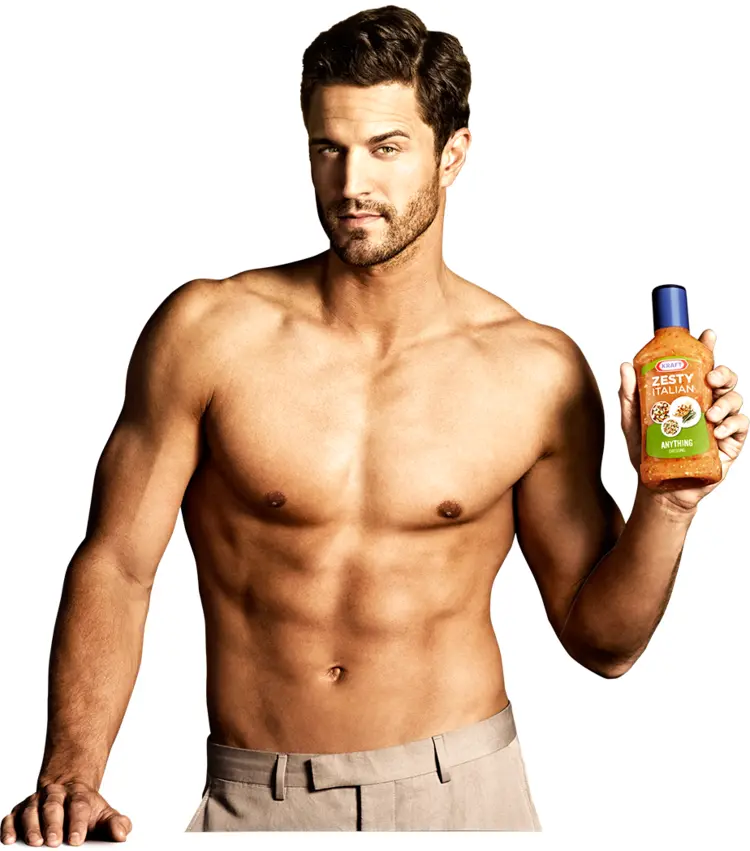 Shirtless Man Holding Salad Dressing Bottle