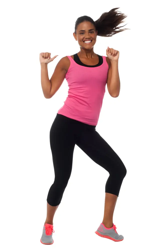 Happy Woman Dancing in Pink Sportswear