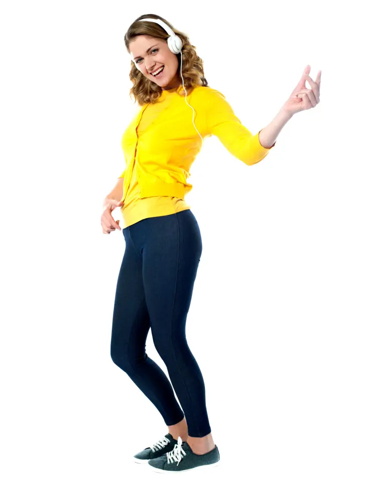 Dancing Woman in Yellow Outfit with Headphones